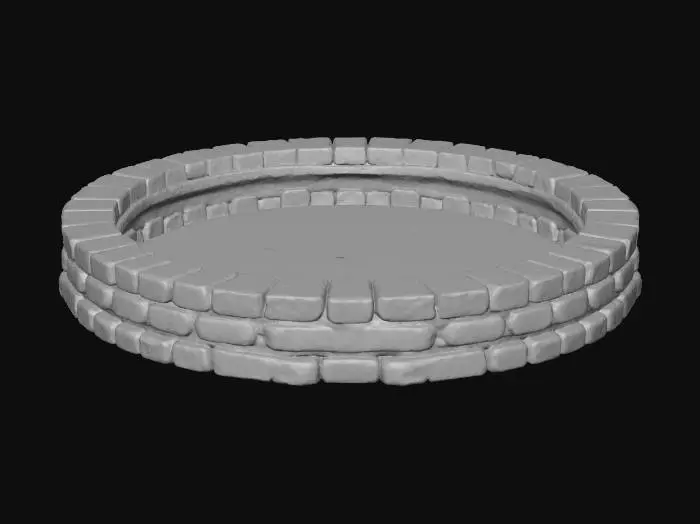 3D model for A round brick pool, as you might find in an onsen or natural spring. The spring has dried up, the pool is empty. The bricks are quite large.