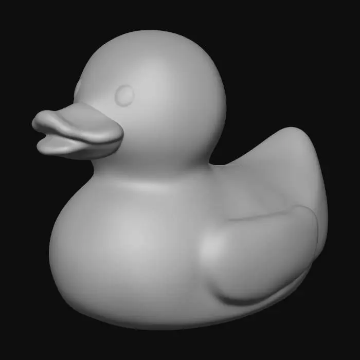 3D model for A classic bright yellow rubber duck, featuring a smooth, slightly glossy surface with a distinctly squishy, pliable tactile quality. Its simple, rounded structure includes an orange beak and two small, painted black eyes on either side of its head. The duck's form is iconic and cartoon-like, suggesting a buoyant and playful appearance.