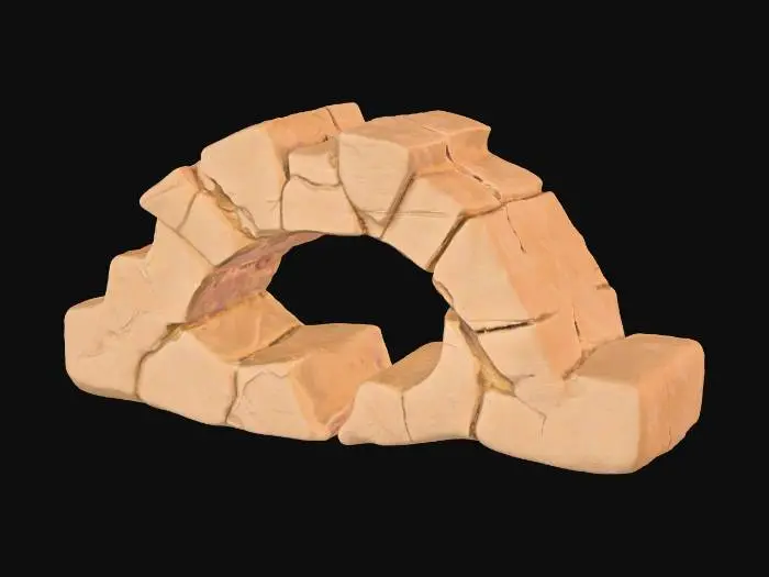 3D model for A second broken sandstone rib segment, this one featuring a prominent midspan hole that pierces through its robust form, creating a weathered aperture. The inner edges of this hole are jagged and irregular, suggesting natural erosion or forceful impact. Despite the central void, it retains its flat end caps, making it suitable for modular tiling. Composed of granular sandstone, it exhibits warm ochre and reddish-brown hues, with a rough, weathered texture across both its exterior and the exposed interior of the hole.