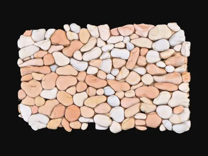 3D model for A low-profile pebble strip mesh, measuring 4x1x0.05 meters, is densely packed with numerous rounded pebbles, each ranging from 2 to 6 centimeters in diameter. The pebbles vary in natural colors from muted grays and sandy browns to hints of ochre and deeper terracotta, exhibiting smooth, water-worn textures. This continuous strip forms a uniform, flat surface, designed to interlock seamlessly with other sections for a repeating border. The overall structure feels firm and compact beneath the touch.