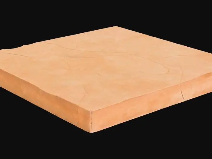 3D model for A substantial sandstone floor slab, measuring 2x2x0.1 meters, forms a broad, relatively thin planar surface. Its color is a warm, earthy ochre, typical of sandstone, with subtle variations in tone. The surface exhibits a slight camber, giving it a gentle, almost imperceptible curve. A fine layer of pale dust has settled unevenly across its gritty, coarse texture, making it feel dry and slightly abrasive to the touch, while the overall structure remains solid and unyielding.