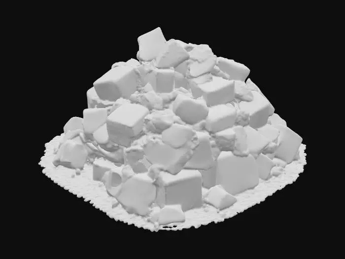3D model for A small masonry debris pile, measuring 1x1x0.5 meters, forms a low, irregular mound. It consists of numerous scattered, angular small blocks of various sizes, primarily composed of a light, sandy-colored masonry material, possibly sandstone, with some darker fragments. The blocks have rough, broken surfaces and sharp edges. Fine, pale dust heavily coats and settles between the blocks, creating a soft, powdery texture. The pile feels fragmented and gritty to the touch, with individual pieces feeling solid and abrasive.