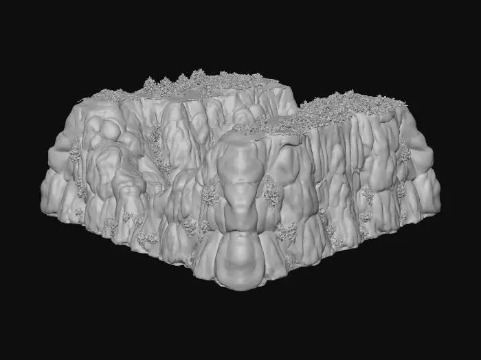 3D model for Eine ausgedehnte, felsige Landschaftsbasis mit sanften Erhebungen und Vertiefungen, die ein weites Tal formen. Im Hintergrund erhebt sich eine majestätische Bergkette mit schroffen, grauen Gipfeln, deren Felsflächen eine raue, erodierte Textur aufweisen. Der Vordergrund ist durch ein tiefes Tal gekennzeichnet, das von einer markanten, gewundenen Spalte durchzogen wird, deren glatte, ausgewaschene Kanten auf zukünftiges Wasser hindeuten. Die Erdoberfläche zeigt erdige Brauntöne und Grüntöne, durchsetzt mit kargen Felsen.
Die Berge haben alle graue Spitzen und sind solide ausgefüllt. In der Mitte vn ader Spalte für den Fluss, ist genügend Platz um einen ganzen Wald herum zu platzieren.