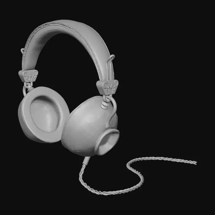 3D model for Необычные наушники с оголовьем из светло-серой кожи и металлическими креплениями цвета слоновой кости. Чашки наушников заменены разрезанными пополам фарфоровыми чайными чашками с ручками. Чашки украшены изысканным узором из розовых и красных роз с зелеными листьями, а также бирюзовым бордюром. Внутренние края чашек имеют золотистую окантовку. От правой чашки отходит витой кабель цвета слоновой кости. Освещение студийное, с мягкими тенями, подчеркивающими детали фарфора и текстуру кожи.