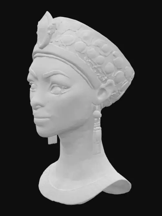 3D model for A regal depiction of Queen Cleopatra's face, featuring a finely sculpted nose and full, serene lips. Her eyes are almond-shaped and meticulously lined with deep black kohl, extending outwards in an elegant sweep. Her skin possesses a smooth, sun-kissed texture, rendered with subtle, warm tones. Adorning her head is an elaborate gold crown, intricately detailed with polished gemstones, reflecting a cool, brilliant luster, and featuring delicate, ornate carvings.