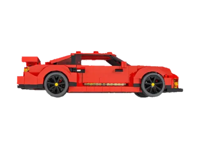 { "Object": "life-size LEGO-style car", "Material": "ABS plastic bricks",… - Blocky 3D model, vytvořený pomocí AI