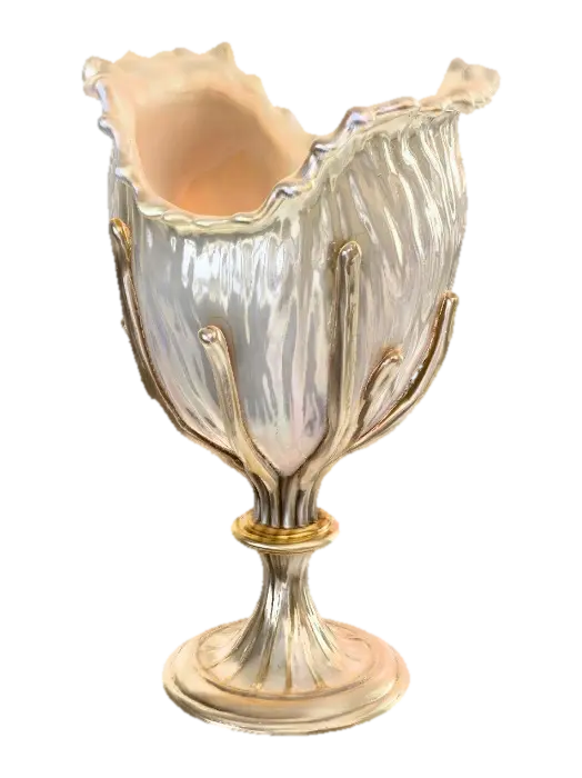 3D model for a ceremonial chalice shaped like a nautilus shell, spiraled with pearl-inlaid ridges and gold ribbing. Tentacle-like silver supports extend as the base. PBR textures: pearl with iridescence, brushed silver, polished gold, and mother-of-pearl interior with subsurface shimmer. Optimized geometry for real-time rendering, with baked AO and high-resolution normal maps.