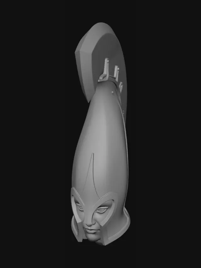 3D model for Modifica il primo elmo. La parte bassa deve terminare allo stesso modo di quella del secondo elmo. Il volto deve rimanere com'è. Rimuovi tutte le rune incise. Non modificare la cresta.