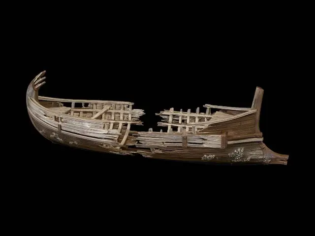 3D model for Broken ancient Spartan trireme wreck, semi-realistic AAA game asset concept art, isolated ship only, transparent background, no water, no environment, ship split in half from the center, massive structural damage, shattered wooden hull, broken deck, exposed ribs and beams, no sail, no mast, no oars, weathered wood textures, vibrant natural wood colors, realistic materials, clean readable silhouette, medium detail, easy-to-model shapes, side-scroller readability, three-quarter side view, soft diffuse lighting, no bloom, no HDR, no cinematic effects, game-ready environment asset.