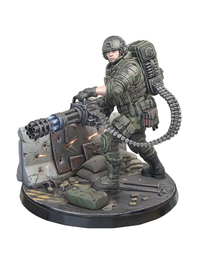 3D model for heavy-weapons female specialist crouching firmly behind a low barricade on a battle-scarred street base. She is equipped with a heavily padded armor vest, multi-layered utility belts, and a mechanical ammo-feed chute extending from her large backpack to a massive, rotating micro-gun with glowing blue barrels. Her face holds an intense, focused expression. Requirement: Tabletop wargaming hero, focus on heavy equipment density and industrial details.