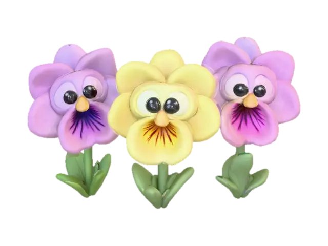 A trio of talking chibi flowers (pansies) alice in wonderland stylized cartoonish… 3D model, vytvořený pomocí AI
