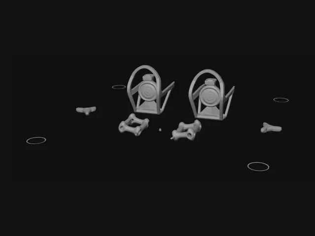 3D model for Miniature brass cages on a metal workbench