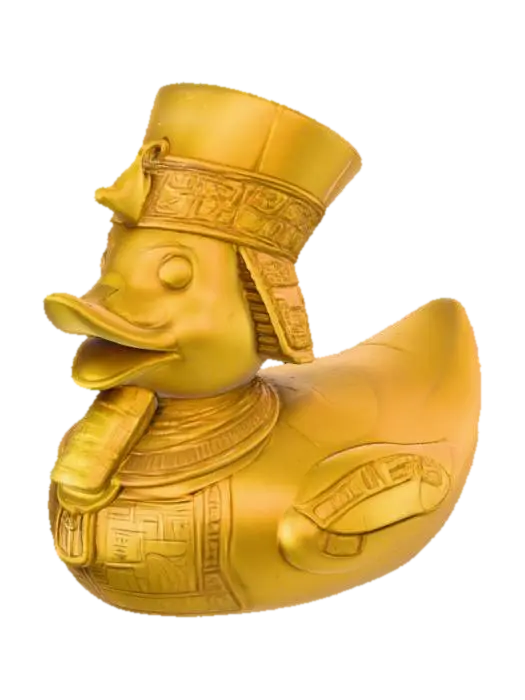 3D model for A Pharaoh rubber duck, solid 3D model. Classic rounded duck body adorned with an ancient Egyptian Nemes headdress, bold and stylized for printing. A sculpted ceremonial beard extends from the beak. Wings decorated with carved hieroglyphic patterns and ankhs in embossed relief. A staff and crook crossed across the chest, chunky and durable. Surface detailed with simple geometric engraving for texture. Watertight geometry, bold forms, and no fragile thin parts