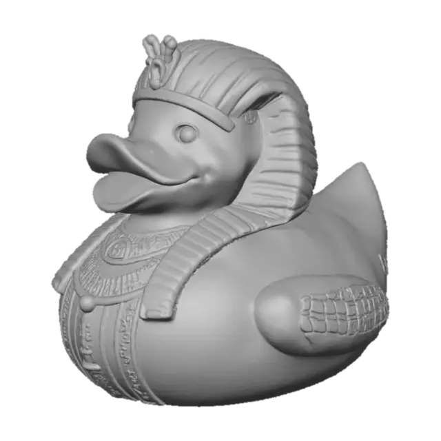 3D model for A Pharaoh rubber duck, solid 3D model. Classic rounded duck body adorned with an ancient Egyptian Nemes headdress, bold and stylized for printing. A sculpted ceremonial beard extends from the beak. Wings decorated with carved hieroglyphic patterns and ankhs in embossed relief. A staff and crook crossed across the chest, chunky and durable. Surface detailed with simple geometric engraving for texture. Watertight geometry, bold forms, and no fragile thin parts