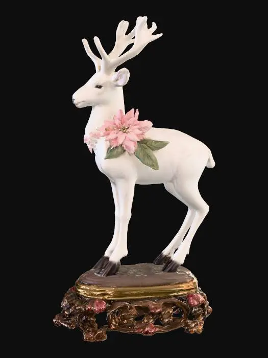 3D model for Porcelain reindeer with pale pink hand painted poinsettias on it's body. This figurine should be on an ornate base. 