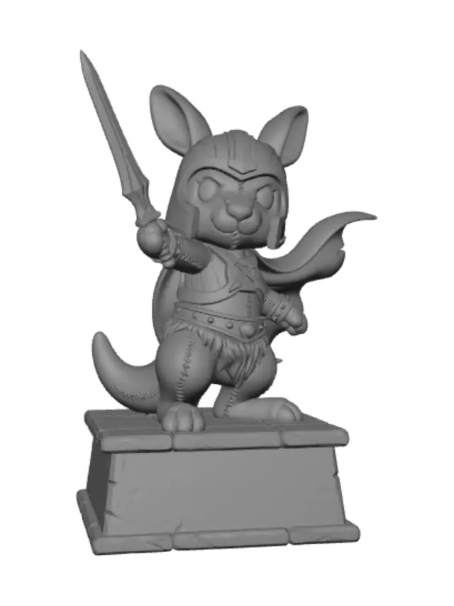 3D model for Ein süßes Plüsch Kurzschwanzkänguru, in Schwert-Action, der ein He-Man Kostüm trägt. Die Figur steht auf einem Sockel mit der Aufschrift: Masters Of The Universe.