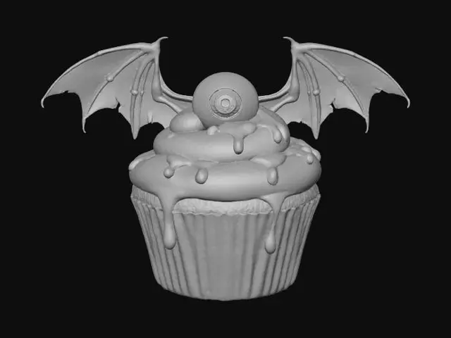 3D model for A spooky Halloween cupcake with lime green glossy icing in a hot pink cupcake cup, with A single eyeball on top, and large bat wings. #Halloween2025#