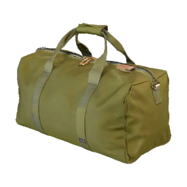 3D model for A utilitarian duffel bag, cylindrical in shape, crafted from tough, faded army green canvas. Its surface feels rough and durable, with a visible weave texture and signs of light scuffing. It has a single main zippered opening along the top and two robust canvas handles stitched securely. The material is dense and firm, designed to withstand heavy loads, feeling weighty and resilient.