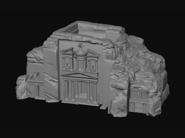 3D model for A majestic 3D model of Petra's Al-Khazneh (The Treasury), carved directly into rose-red sandstone. Its towering, classical facade features intricate columns, ornate friezes, and carved deities, presenting a weathered yet grand appearance. The stone varies in warm pink and orange hues, with a rough, ancient texture, conveying immense historical weight and architectural marvel.