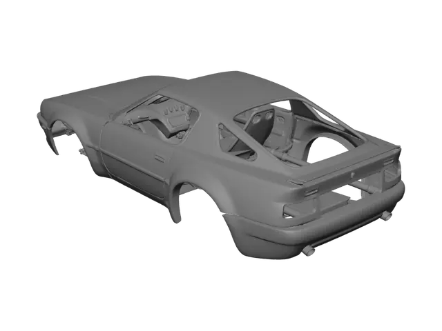 3D model for It needs to be the body shell of a 90s era British car. Perfectly symmetrical along it's length. Just the naked body shell. No windows. No wheels. No engine.