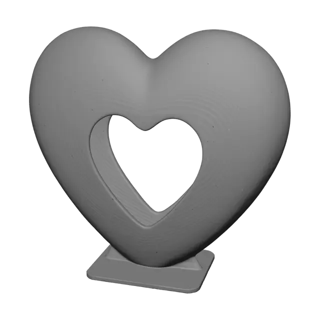 3D model for A large girly, organizer in the shape of a big heart, have a large empty heart shaped opening near the top. It needs a small flat surface on the bottom of the heart so it can stand.