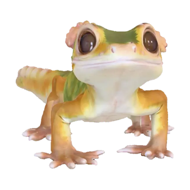 3D model for A charming, game-ready crested gecko model, designed with an emphasis on cuteness. It features large, expressive eyes and a soft, velvety texture across its mottled skin, which shifts between earthy greens, browns, and creams. Its distinctive crests run down its head and back, appearing delicate and slightly rubbery. The overall shape is sleek and agile, with slender limbs and a prehensile tail, conveying a gentle and endearing demeanor suitable for a friendly creature in a game.
