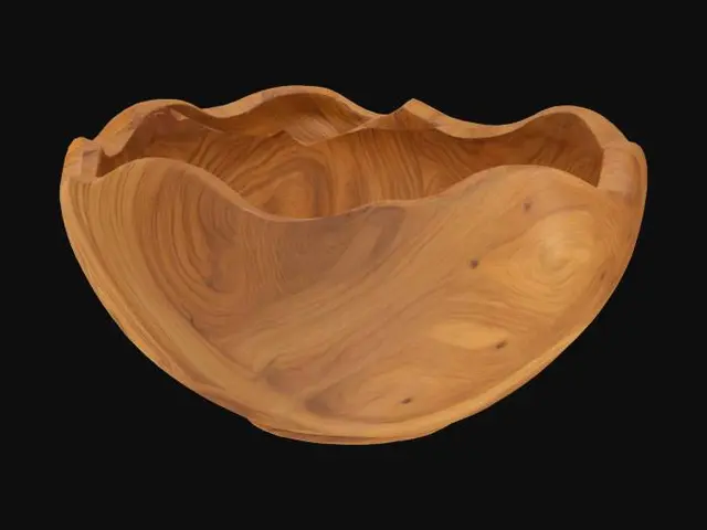 3D model for Generate a highly detailed 3D model of a single carved wooden home décor item. It should showcase natural texture and tones of wood—walnut, oak, or teak—with visible grain, chisel marks, and polished or matte finishes.