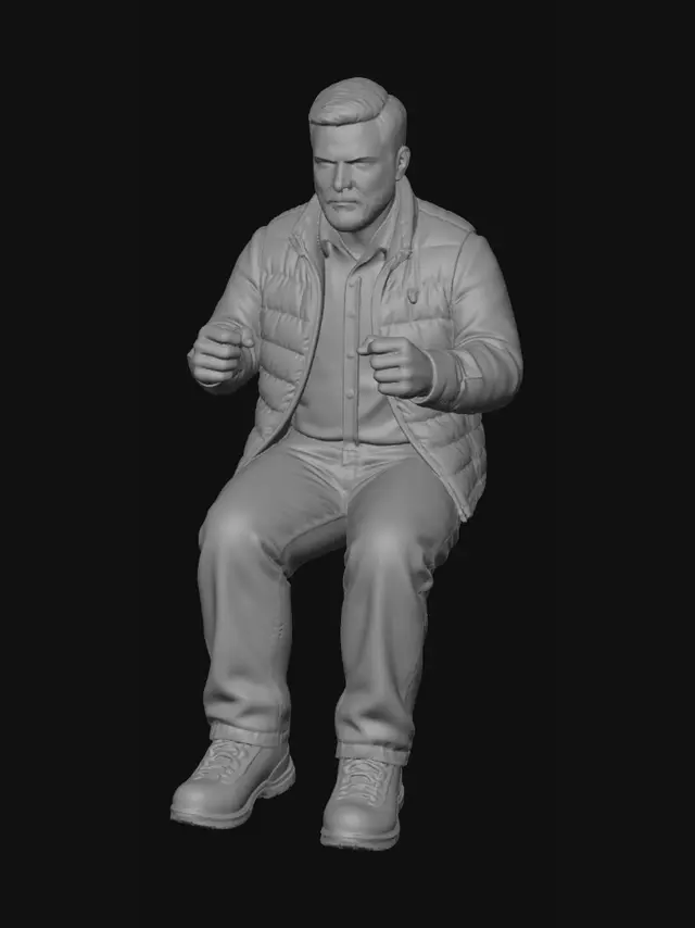 3D model for Create a 1/10 Scale realistic male figure. He would be in a sitting position, no base (invisible seat). His hands in a driving position, open hand, fingers slightly curled. His legs bent in a comfortable sitting position and 100 degrees. Knees slightly together. He is a around 40. He has brown hair, short cut, crew cut style, brushed to the right. He has a full beard. He is wearing a flannel shirt, with a puffer vest unzipped. He is wearing loose fit, carpenter style, denim jeans and hiking boots. Strong, medium sized hands, not too small.