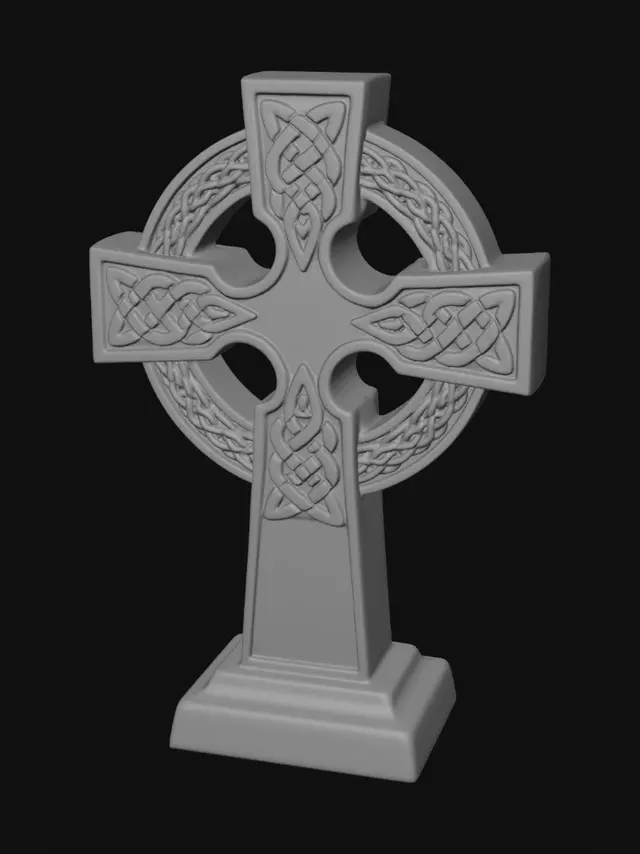 3D model for A celtic cross, cast from aged bronze with a subtly darkened patina. Its surface prominently features a raised Celtic cross, intricately detailed with interwoven knotwork that gives a tactile, textured feel. The bronze exhibits a warm, antique luster, highlighting the precise structure of the cross's arms and ring. The overall form is solid and well-balanced, indicating both decorative artistry and functional strength.