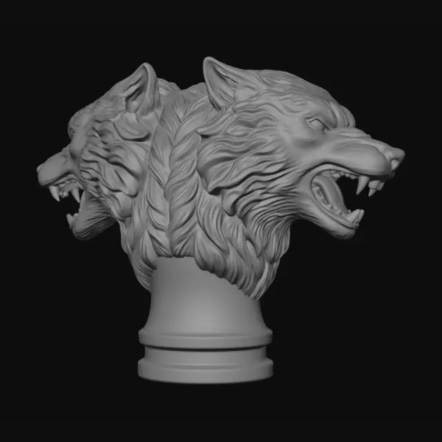3D model for A captivating sword pommel, intricately sculpted into the fierce head of twin snarling wolves, facing opposite directions. Crafted from darkened, burnished steel, it exhibits a robust, metallic sheen. The wolf's fur is finely textured with subtle engravings, giving it a tactile, realistic feel. Its features, including sharp fangs and piercing eyes, are precisely defined. The pommel is a solid