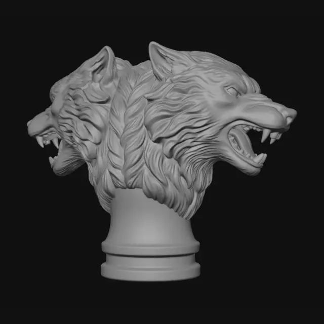 3D model for A captivating sword pommel, intricately sculpted into the fierce head of twin snarling wolves, facing opposite directions. Crafted from darkened, burnished steel, it exhibits a robust, metallic sheen. The wolf's fur is finely textured with subtle engravings, giving it a tactile, realistic feel. Its features, including sharp fangs and piercing eyes, are precisely defined. The pommel is a solid