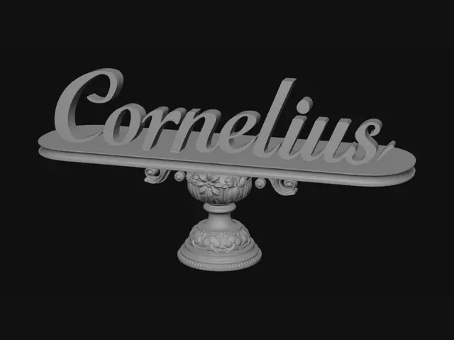 3D model for Ich brauche ein Schild mit der Aufschrift "Cornelius" für eine Hochzeit. Bitte nur Buchstaben die auf einem Sockel liegen.