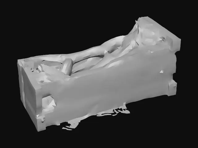 3D model for Burned and broken wooden furniture lies on its side, deeply charred and blackened from a fire. It is rendered with clean, angular geometry.
