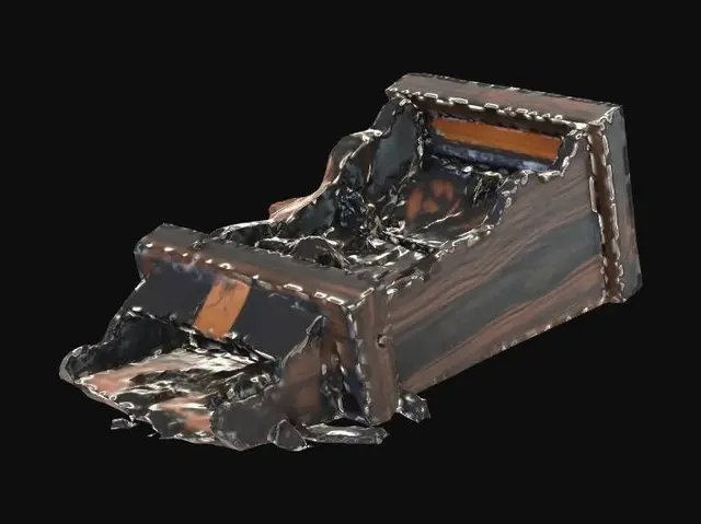 3D model for a Burned and broken wooden closet lies on its side, deeply charred and blackened from a fire. Very low res. It is rendered with clean, angular geometry.
